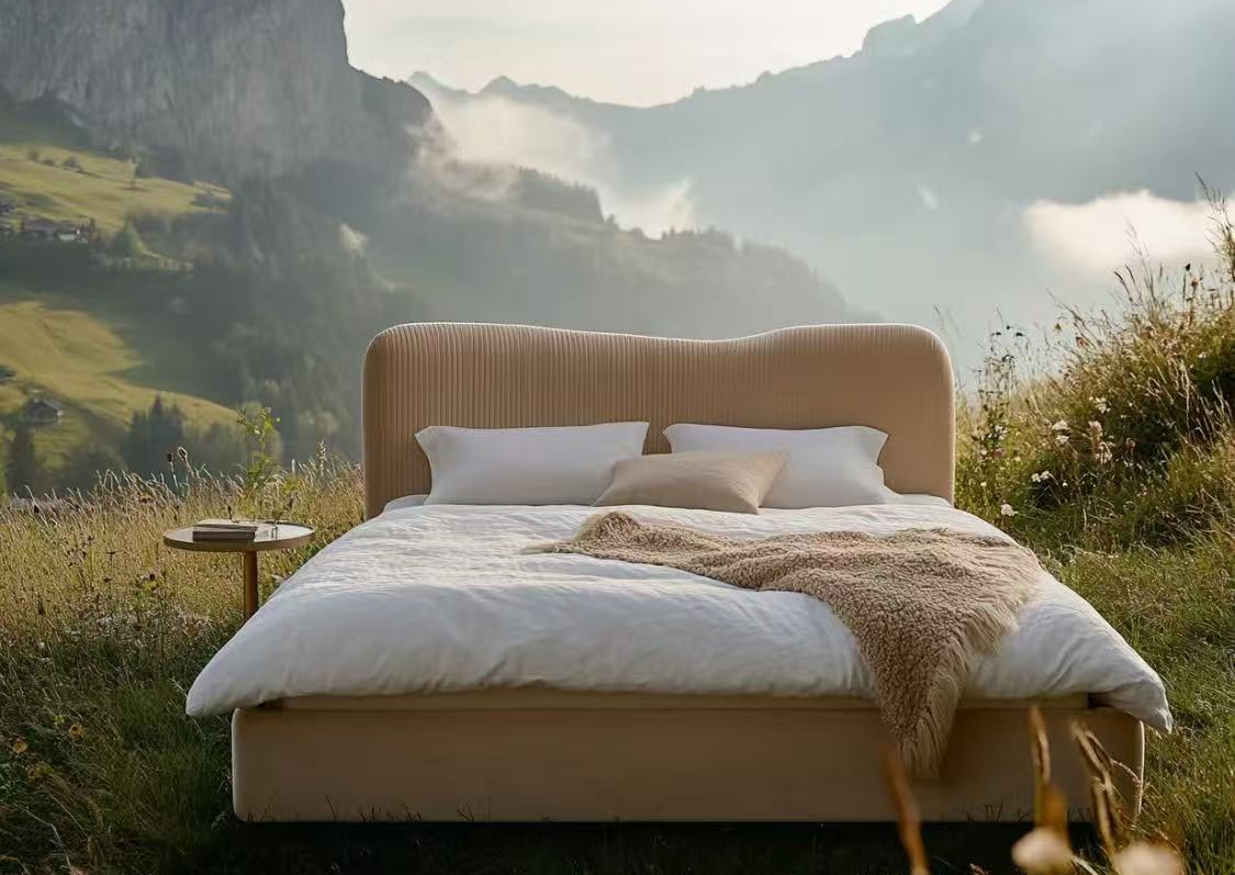 Fluted-headboard bed on a ridge with gold seal in the corner
